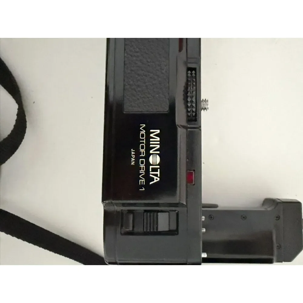 Minolta X-700 with accessories and carry case.